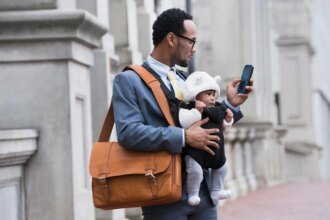 balance-family-and-work-parent-with-baby-in-carrier