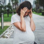 Pregnant woman annoyed